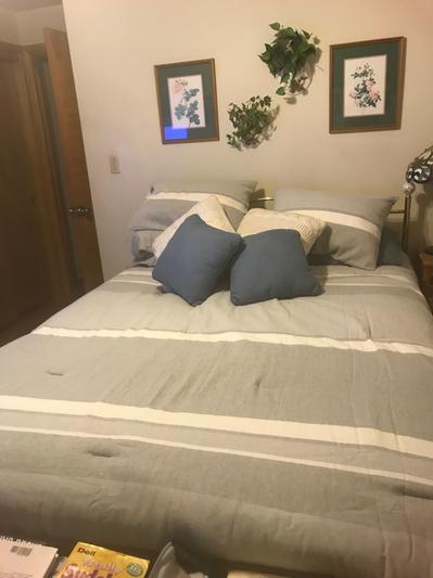 I added my throw pillows to add a dash of color