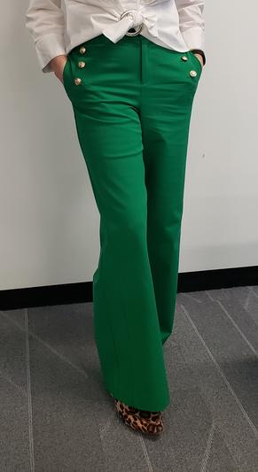 Front view with hands in pockets