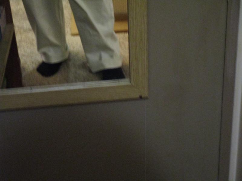 with one rolled up leg