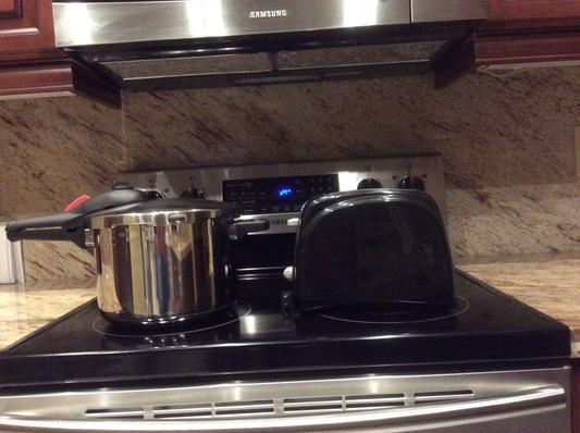 I placed it next to a 2 slice toaster for size reference