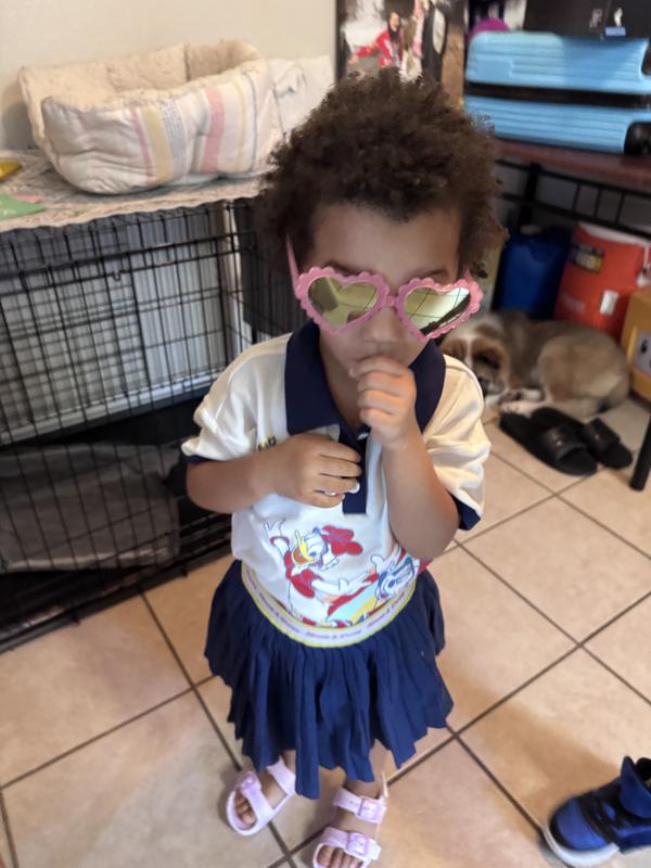 Loved her Minnie and Daisy shirt with skirt