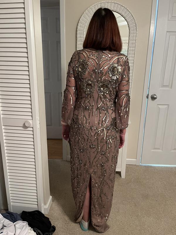 **Portia and Scarlett's Blue Feather-Embellished Sheath Gown: A Symphony of Elegance for Special Occasions**