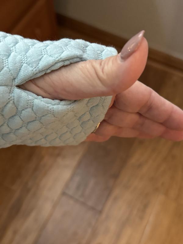 Thumb hole.  Nice for keeping hands warm.