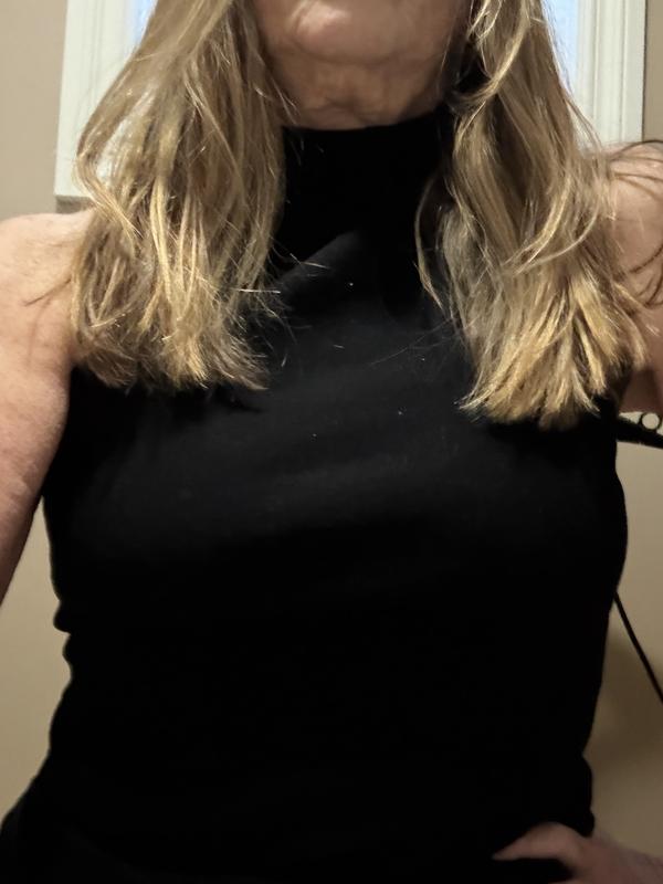 Black sleeveless high neck top