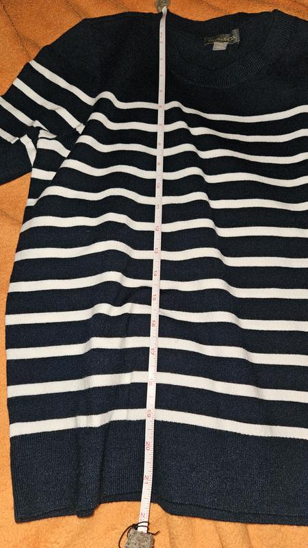 Length of Petite Medium is waist length on me at 5' tall. May be short on others.