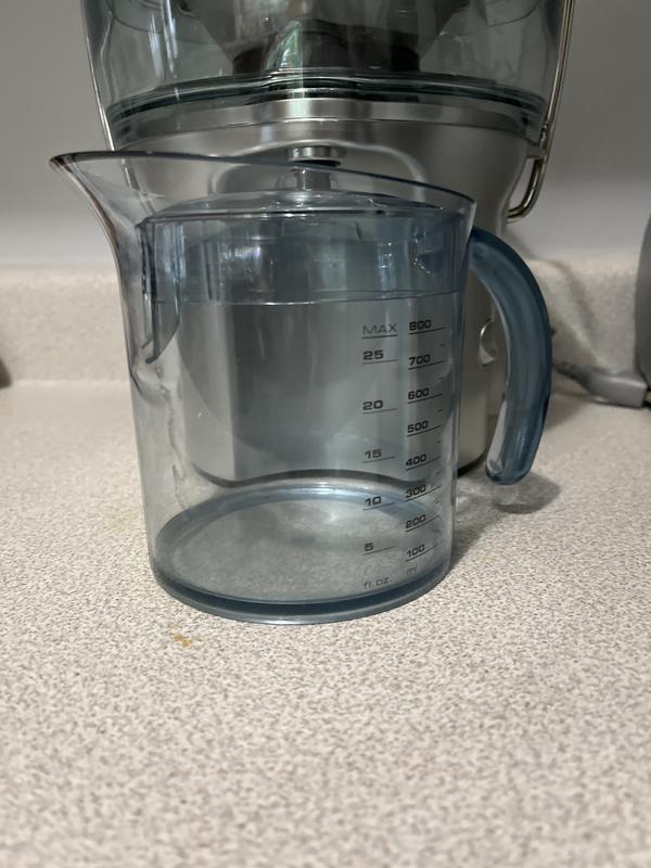 Pitcher. Slides too easily. However. I had to move my juicer slightly due to top counter top in the way.