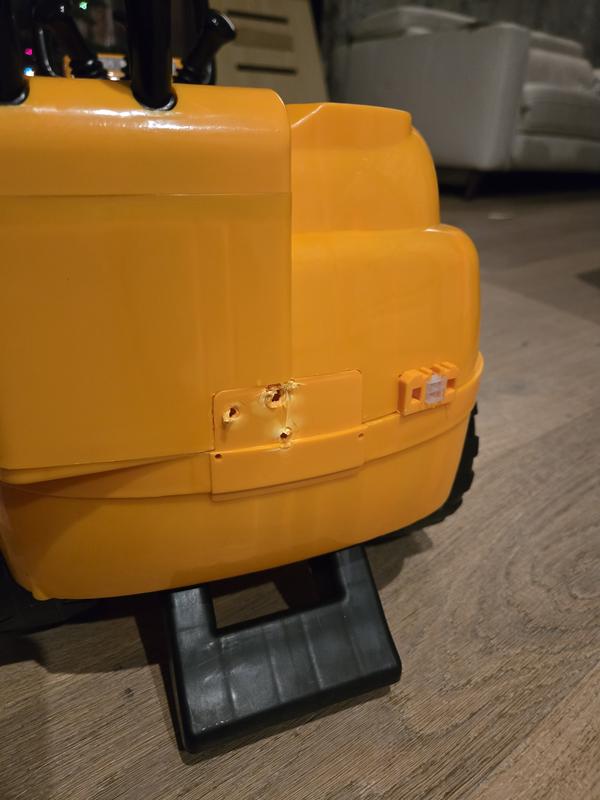 We tried to open the connection port like in the picture. We used lots of tools including a drill to try to expose the opening. Nothing worked. They clearly sent the wrong truck.