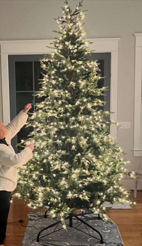 I’m 5’ tall. I placed it where I could easily decorate it, then slide it in a throw to easily move it to a corner.