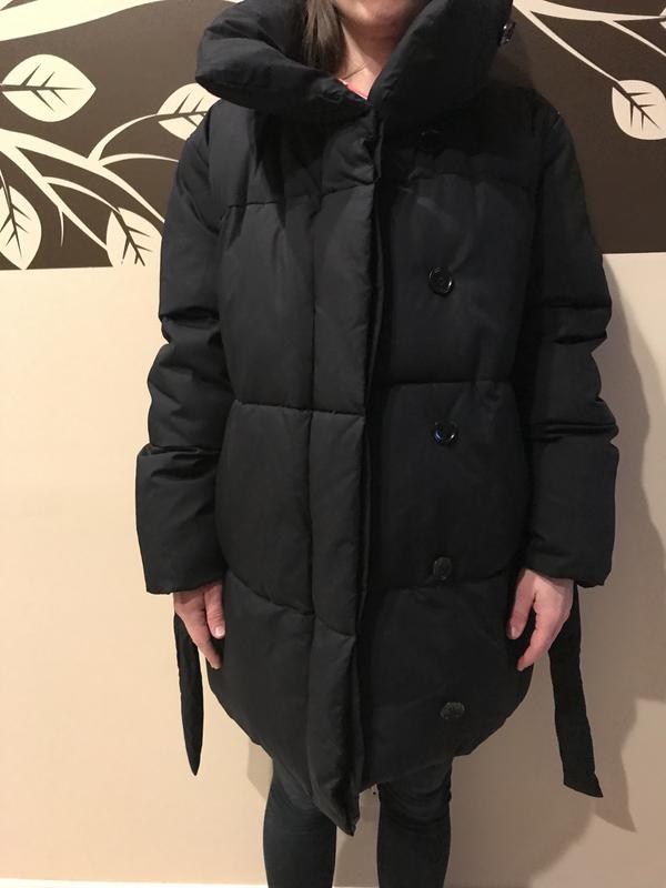 Coat with belt untied