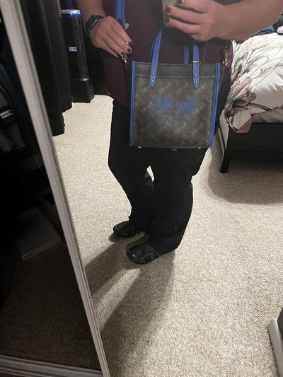 The shoulder strap is a little too short for my liking. It is adjustable but its on its longest length pictured.