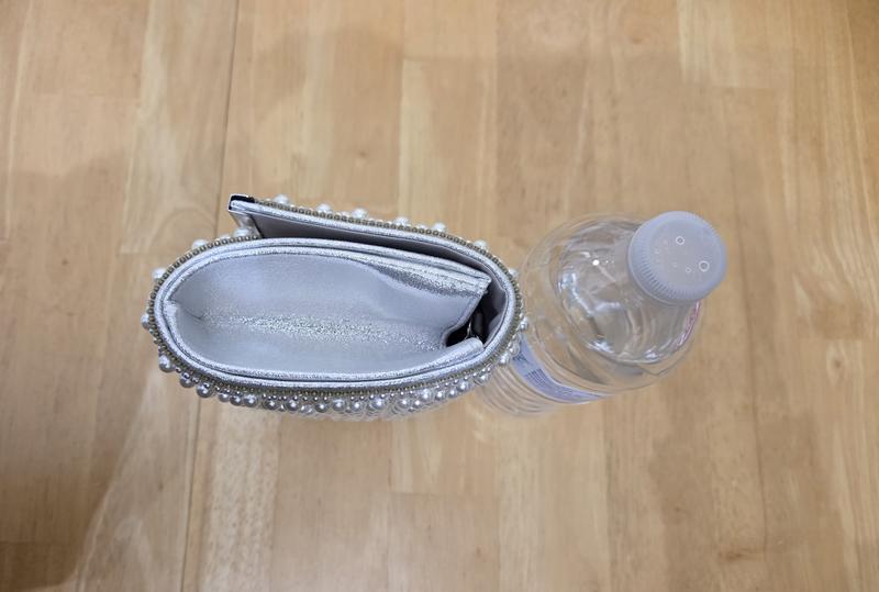 I put a 16 ounce water bottle next to the purse for reference.