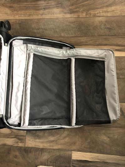 The Velcro and buckles make it easy to remove the garment bag.