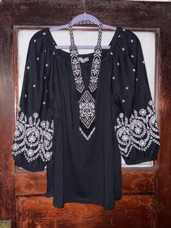 Looks beautiful paired with a statement necklace!