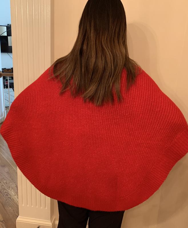 Hands on hips, view from back