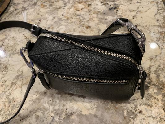 Diagonal zipper across top