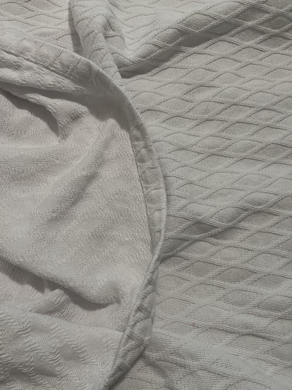 The underside and top side in color white. It is true white the lighting in my room is warm.