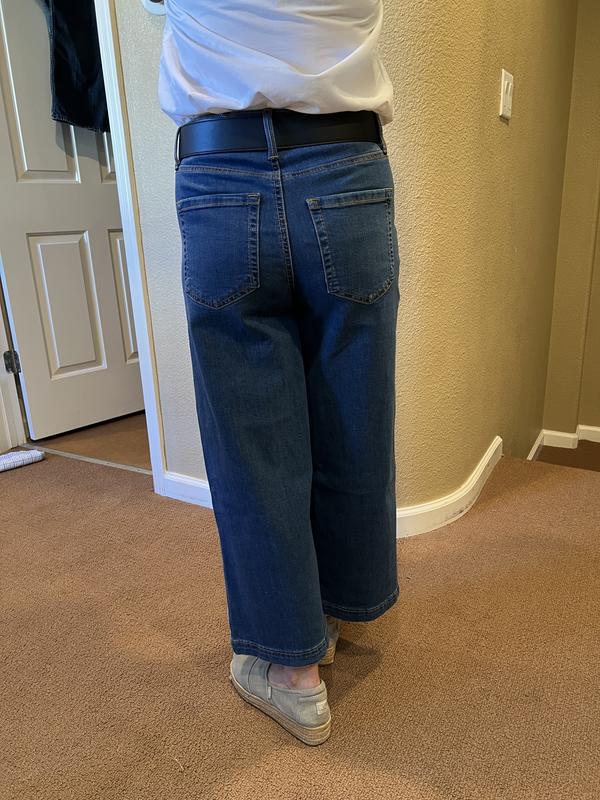 Fitted through the waist and hips with wide but straight legs.