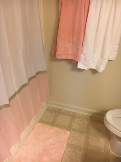 Towels and rug don't match