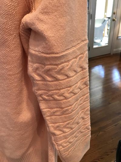 Cable knit on lower sleeve