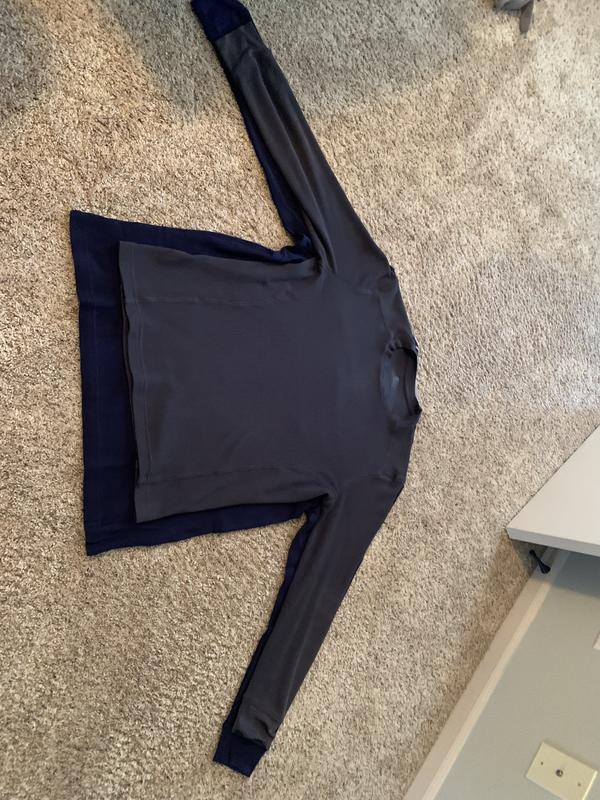 Before washing it looks huge! (Club shirt behind Starter brand thermal)