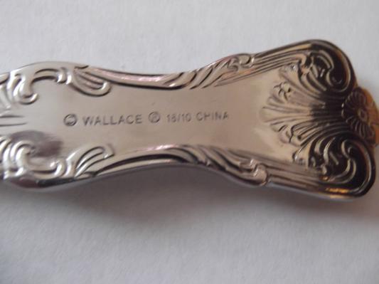 "Wallace 18/10 China" stamped on the back of each piece (wish it wasn't)
