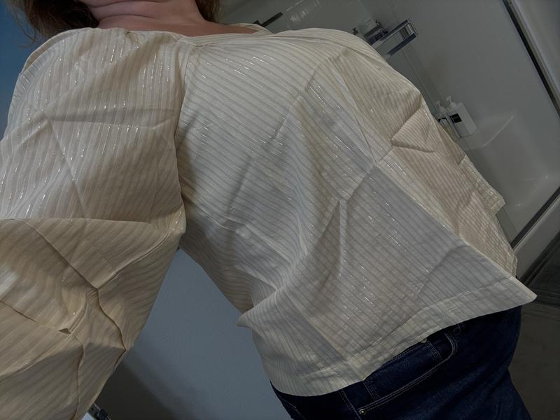 Way too short in the tummy area for a plus-sized blouse.