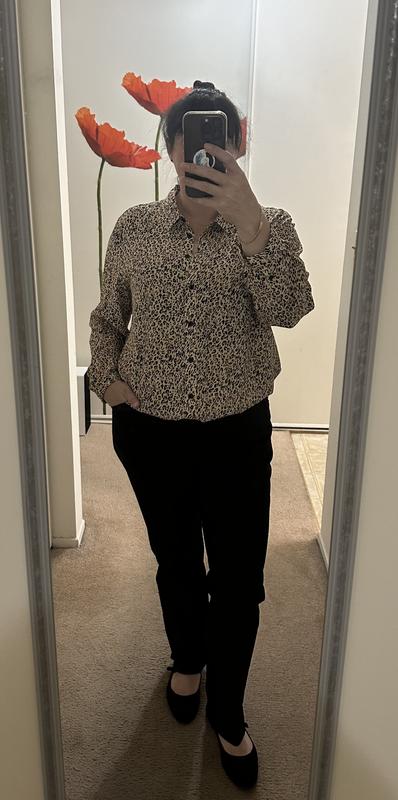 Shirt worn with jeans.