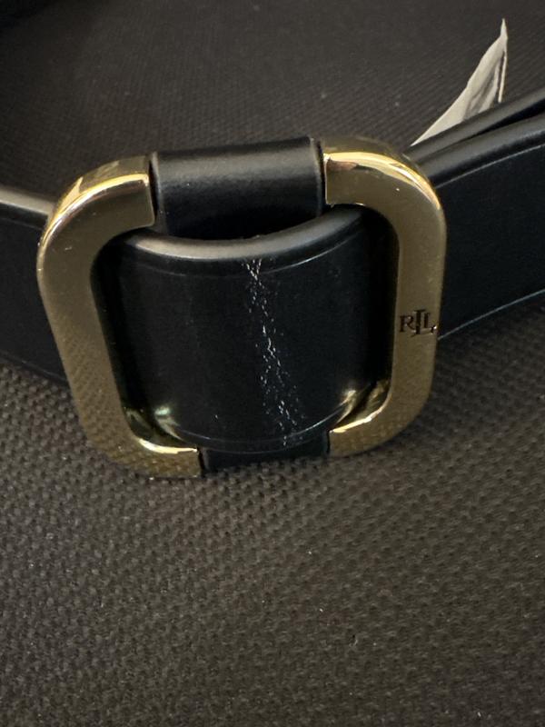 The belt is brand new. Never been warm. I passed the belt thru the buckle to prep it as a gift and the quality presented itself to my disappointment.