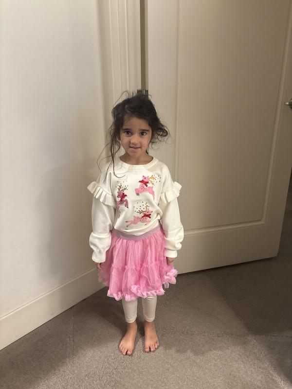 Purposely bought a larger size so she can wear it next Xmas season too.