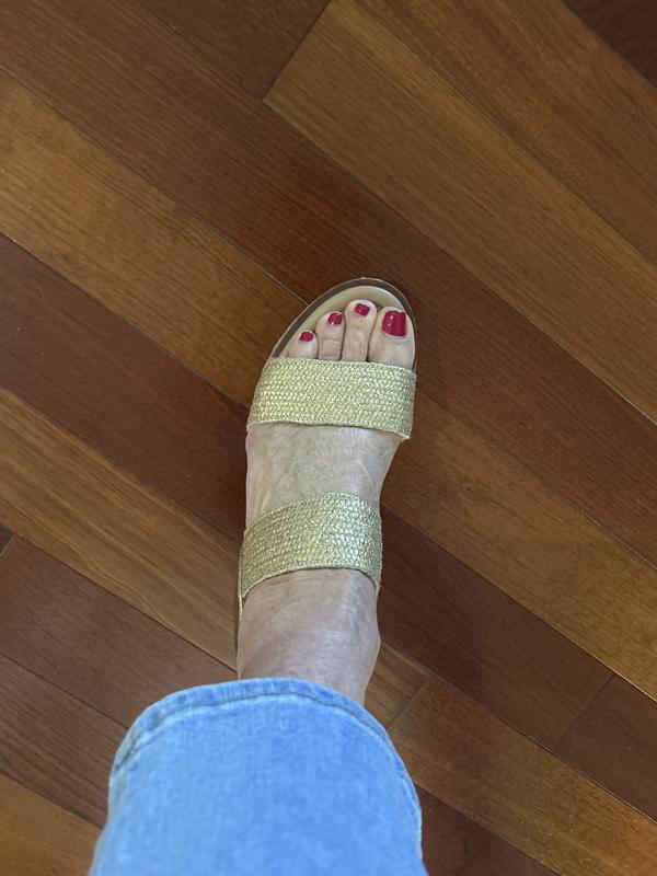 Pretty from the side and the top. Small wedge heel.