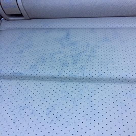leather car seat stained
