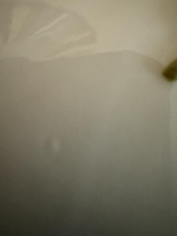 Hard to see, but shows the bubbles in the finish.