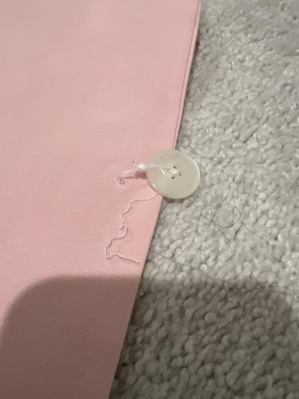 Button loose before I even got to wear it for the first time. Sad.