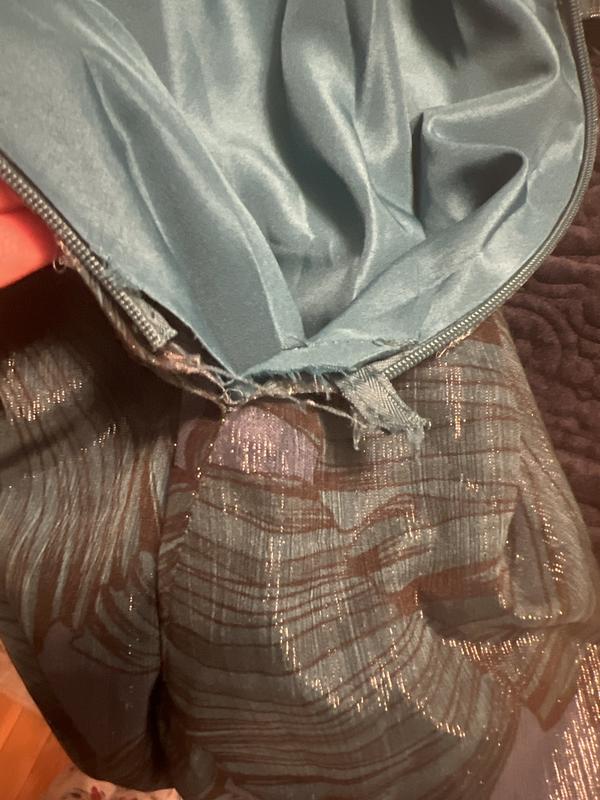 Zipper was broken and fabric was ripped!