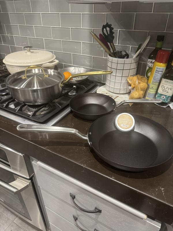 In the background.. the brass handle is everything. Stir fried some cabbage w onions. Came out amazing   No sticking. The 3qt is perfect size and not too heavy