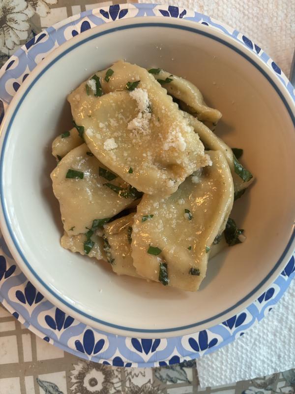 Homemade Agnolotti in brown butter and sage