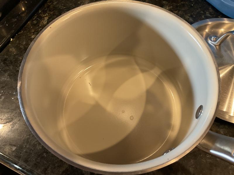 At least 3 chips with normal use and no metal utensils were used on it.