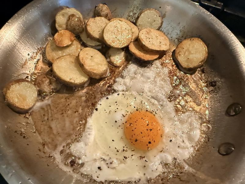 Home fries and an egg over easy