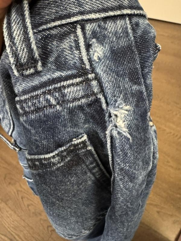 Customer photo for "Two holes after one wash"