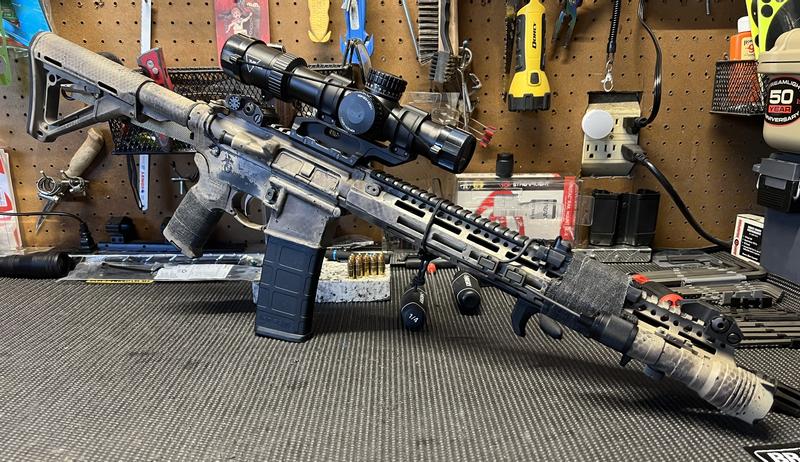 Yes the rifle is spray painted, yes it still works