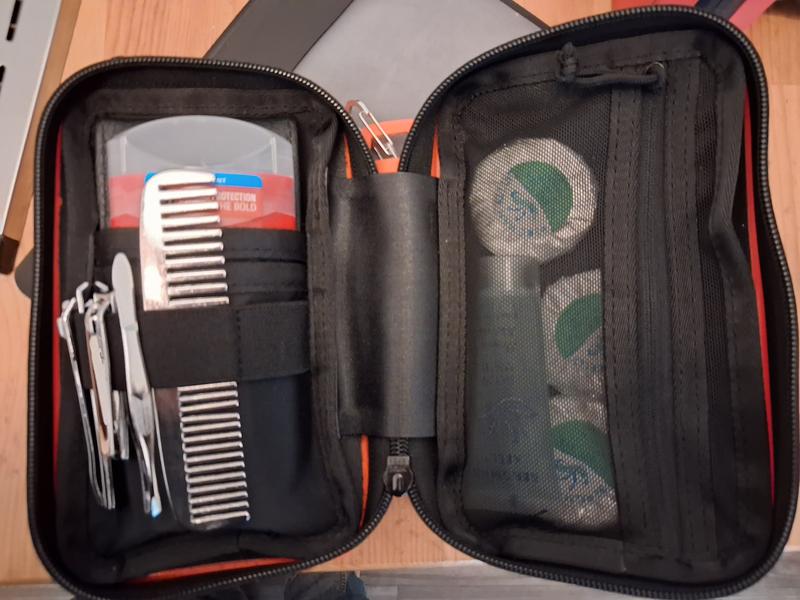 Nice travel kit storing soap, shampoo, razors, deodorant, clippers, etc