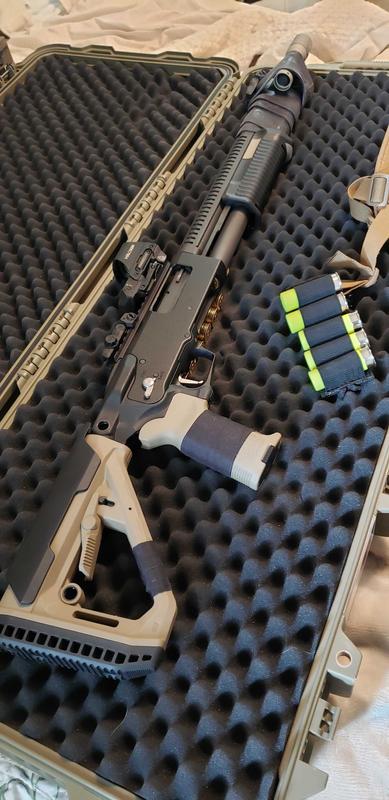 the stock is collapsed, but at longer extension, the grip angle is perfect on this shotty