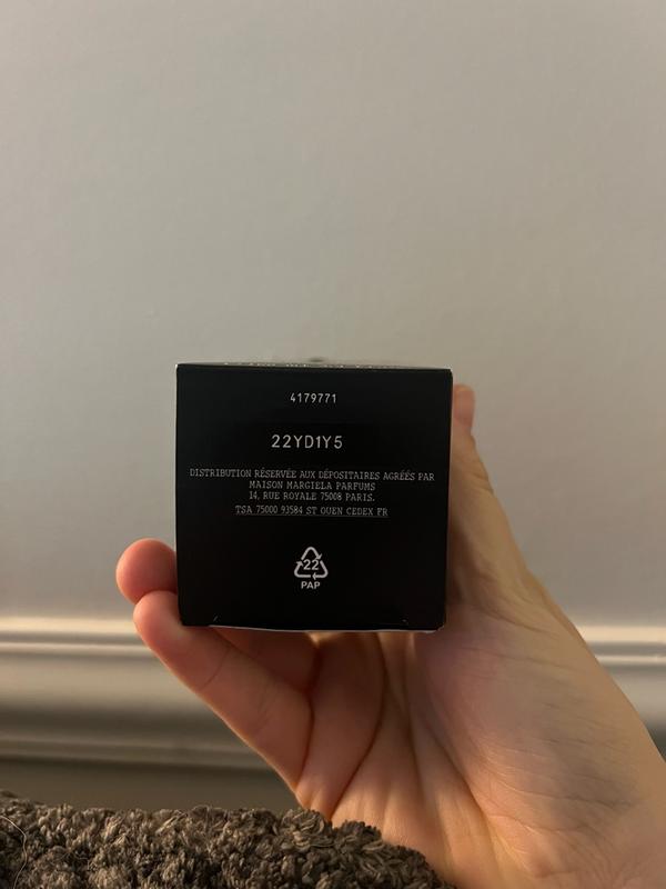 Customer photo for "Quality packaging, not a fan of this scent"