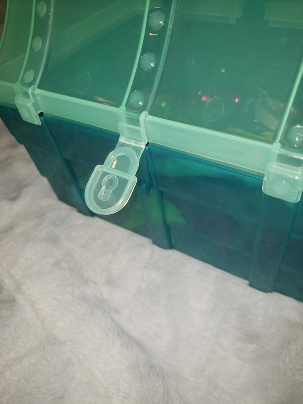 The lock snaps the lid shut