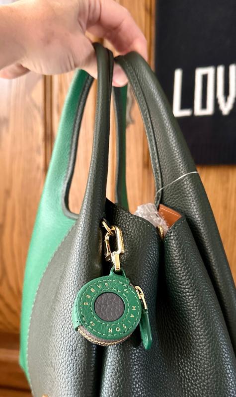 Customer photo for "Emerald Graphite looks REALLY good on a green colorblock bag!"