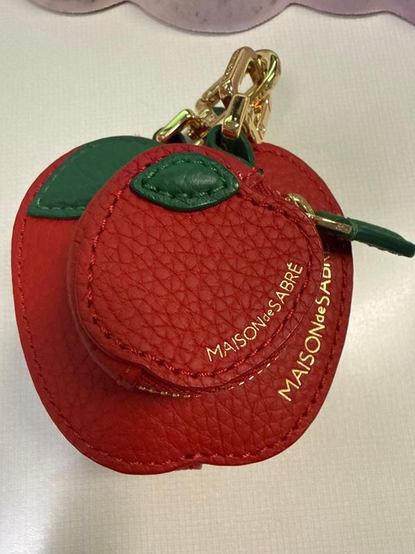 Customer photo for "Obsessed with MAISON De Sabre air tag holders and coin purses"