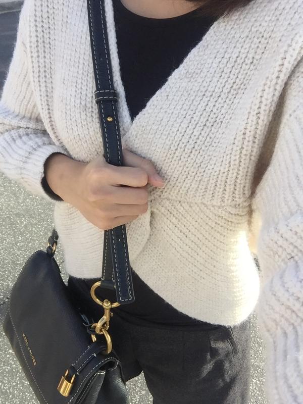 Look he leather strap and lock charm, it's beautiful and detailed.