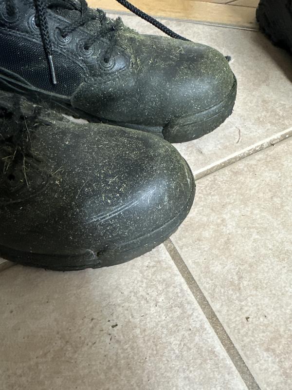 Grass stain but wore for two years hardly scuffed