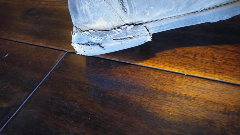 Broken and cracked heel, left foot.