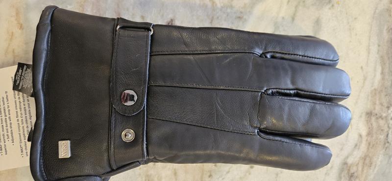 new XL is gauntlet sized and heavily padded with something like lambs wool.